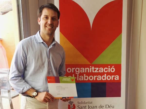Diploma que reconeix Llar 56 com a Organització Col·laboradora